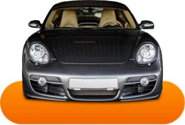 Front view of a sleek, black sports car with prominent headlights, positioned on an orange platform against a black background.