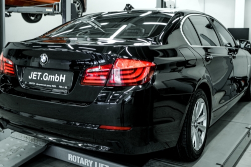 BMW Repair and Maintenance in Rockville, MD at MB Automotive Services. Image of a precise wheel calibration on a luxury BMW 5er f10, ensuring optimal performance and handling.