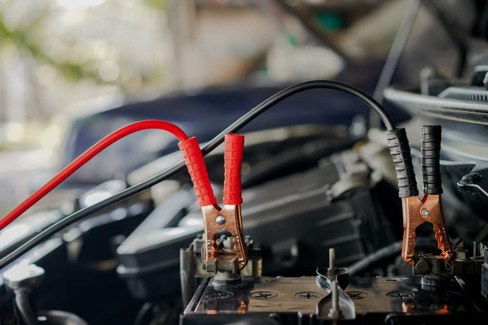 European Car Electrical Diagnosis, Electrical Repair in North Bethesda MD At MB Automotive Services. Close-up view of European car with red clamp for electrical repair